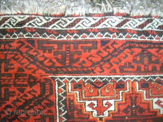 Antique Baluch rug. Size: 107 x 208 cm. With Camel-Wool. One small repair. One small area with thin pile.              