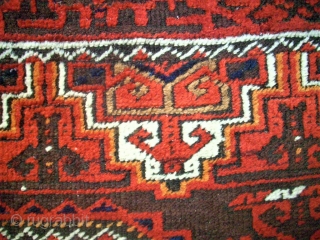 Antique Baluch rug. Size: 107 x 208 cm. With Camel-Wool. One small repair. One small area with thin pile.              