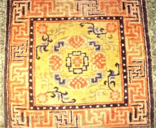 antique Tibet / Chinese sitting-meditation rug. Size: 61 x 183 cm. Some low pile.                   