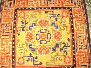 antique Tibet / Chinese sitting-meditation rug. Size: 61 x 183 cm. Some low pile.                   