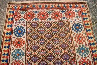 Antique caucasian rug. Size: 116 x 222 cm. At one end some low pile. Interesting rug.                 