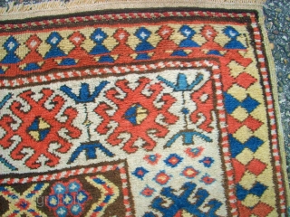 Antique caucasian rug. Size: 116 x 222 cm. At one end some low pile. Interesting rug.                 