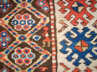 Antique caucasian rug. Size: 116 x 222 cm. At one end some low pile. Interesting rug.                 