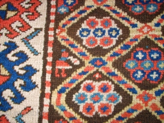 Antique caucasian rug. Size: 116 x 222 cm. At one end some low pile. Interesting rug.                 