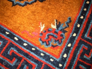 Pair of Tibetan / Chinese rugs. Size: 66 x 60 cm and 66 x 61 cm.                 