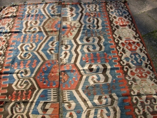 Antique anatolien Kelim! Size: 209 x 155 cm (Both). Used. Holes and repairs. 
I think it was used as a curtain.            