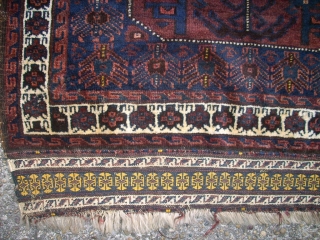 antique Baluch bagface. Size: 82 x 73 cm. Excellent wool. Fine knotting. Used. Some small repairs.                 