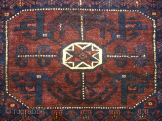 antique Baluch bagface. Size: 82 x 73 cm. Excellent wool. Fine knotting. Used. Some small repairs.                 