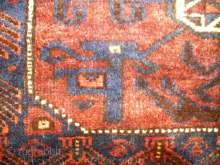 antique Baluch bagface. Size: 82 x 73 cm. Excellent wool. Fine knotting. Used. Some small repairs.                 