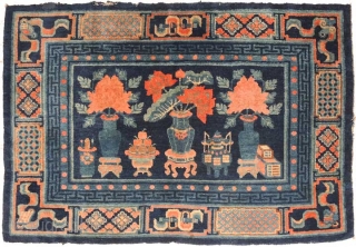 Attractive and very interesting carpet, seemingly from the Baotou-Suiyuan region of China with deep rich lustrous colours. And 'seemingly from Baotou-Suiyuan' only because although the design and colours point to there, this  ...