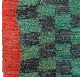 Tibetan three paneled checkered tsuktruk, the three individual strips having been woven separately on a narrow loom and then sewn together to complete the finished product. These tsuktruk type rugs - which  ...