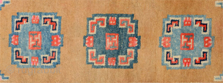 Lovely Tibetan khaden with three mandala-like medallions and uncommon abstract main border motifs. The pile is full throughout, the dyes are excellent and both the warp and weft (and pile) are of  ...