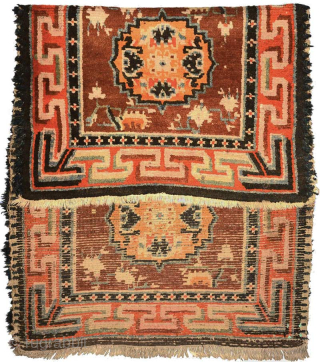 Two seating squares that have almost certainly come from a much longer Tibetan ‘runner’ (a long narrow carpet). Made sometime in the early 1900’s, the size is 135cm x 74cm (approximately 53in  ...