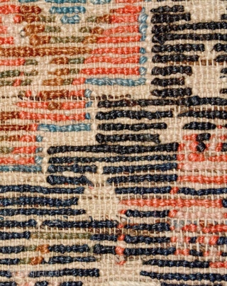 Strikingly vibrant Tibetan khaden with three medallions and the so-called 'frog foot' design scattered throughout the center field. The main border is a well executed interlocking yungdrung (swastika) design with an almost  ...