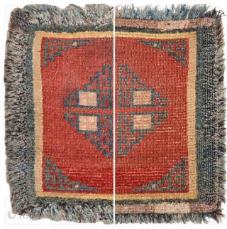 An unusual Tibetan seating square, possibly used in a monastic environment for a monk to sit on. The center mandala-like design features four enclosures that incorporate both the swastika and sauwastika design.  ...