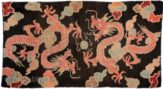 Tibetan khaden with two dragons frolicking in the clouds while competing for the elusive ‘precious gem / flaming pearl’. Made in the early 1900's it has hand spun wool warp and weft  ...