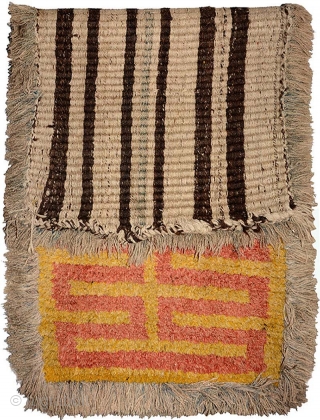 So-called ‘warp-faced-back’ runner (long carpet) woven in the Wangden valley region of Tibet. Given the colours, this thick heavy carpet with its red ladder-like design on a simple yellow background was most  ...