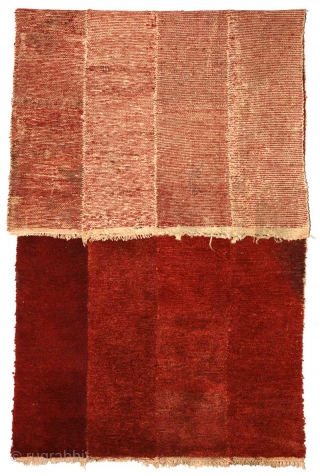 Lustrous burgundy coloured beautifully abrashed four-panel Tibetan tsuktruk with soft deep pile. Woven circa 1900 with hand-spun wool warp and weft and pile which has been coloured using natural organic dye (with  ...