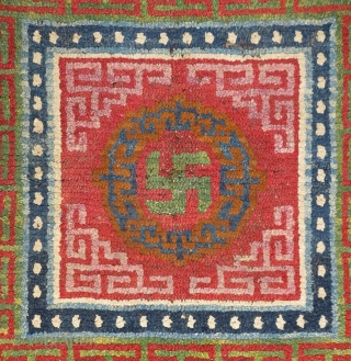 This khagangma, or Tibetan seating square, is simply nothing short of an extraordinary example of Tibetan woven art. Stunningly beautiful, relatively large and in unaltered original condition, it has a central yundrung  ...