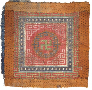 This khagangma, or Tibetan seating square, is simply nothing short of an extraordinary example of Tibetan woven art. Stunningly beautiful, relatively large and in unaltered original condition, it has a central yundrung  ...