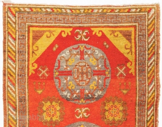 Striking East Turkestan three medallion carpet, probably from either Khotan or Yarkand, which are both ancient oasis towns on the southern branch of the Silk Road in what is today Xinjiang, the  ...