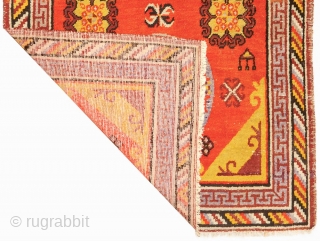 Striking East Turkestan three medallion carpet, probably from either Khotan or Yarkand, which are both ancient oasis towns on the southern branch of the Silk Road in what is today Xinjiang, the  ...