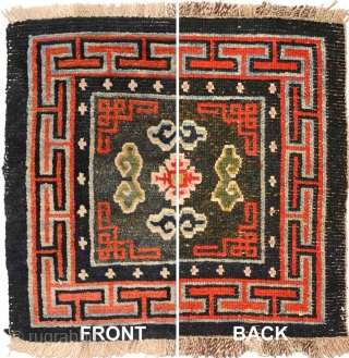 Beautiful richly coloured naturally dyed Tibetan seating carpet. The three dimensional 'Greek T' main border encloses an inner secondary border with crosses that mimic the tie-dyed tigma pattern much beloved by Tibetans,  ...