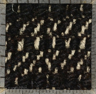 Tibetan three paneled black tsuktruk with a Zeepa (Dzeepa, Zeepak, et al) as the sole central motif, and with spray coming off a wave-like design set across the bottom. These blanket-like rugs are  ...