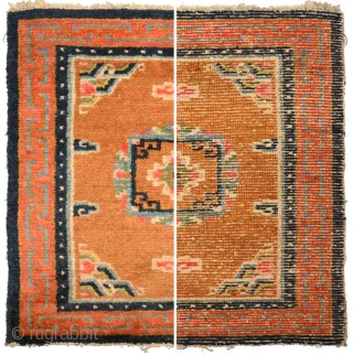 Beautiful Tibetan seating square featuring a mandala like center motif afloat in a light 'goldish-brown' field sparingly decorated with clouds, with the mountain motif anchoring the four corners. The main outer border  ...