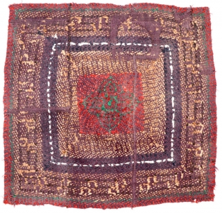 Tibet. Unique pile-less seating square woven in a very interesting and unusual knotting style, being either rural or nomadic work with primarily natural dyes, and un-dyed lustrous wool. The center square features  ...