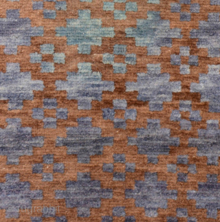 Exceptionally beautiful, intentionally abrashed, Tibetan khaden with all natural dyes. Using the ‘gau box’ (or amulet) design and combining only two colours (brown and blue) with very imaginative mixing, the weaver has  ...