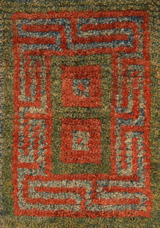 Beautiful Wangden warp-faced-back seating carpet from southern Tibet with thick pile and all natural red, green and light blue dyes with lovely abrash in the pile. The red main field design is  ...