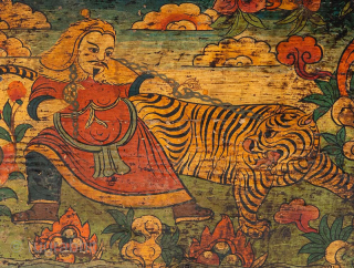 This small Tibetan chest is made of wood with leather trim fastened by metal tabs and painted on three of the side panels with a lifelike illustration known as “Mongol Leading A  ...