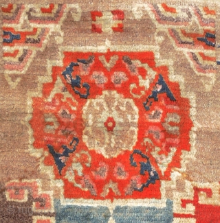 Funky old Tibetan khaden with three mandala medallions and an outer three-dimensional ‘T’ border, while the inner border is decorated using the tigma (crosses) design. Loose floppy village weave made in the  ...