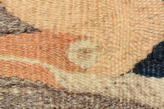 So-called 'Gansu-kilim' from China. This piece vividly displays the wood block print designs scattered throughout the natural undyed wool of the main-field, and is adorned by five Manchurian cranes which are woven  ...