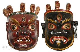 Pair of Bhutanese Mahakala (red and black) painted ceremonial dance masks, hand carved in the early part of the 1900’s. The rich glossy patina was accomplished over the years by liberal coatings  ...