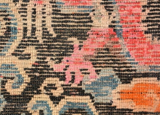 Tibetan seating carpet (khagangma) depicting a single front-facing five clawed dragon, being unusual in that it shows the dragon in profile, as opposed to 'side-on' as is usually the case. The grinning,  ...