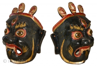 Bhutan masks. Pair of Bhutanese Mahakala wooden dance masks, circa first half 1900’s (probably 1910 – 1930) in excellent condition. The rich glossy patina was accomplished by liberal coatings of Shellac, a  ...