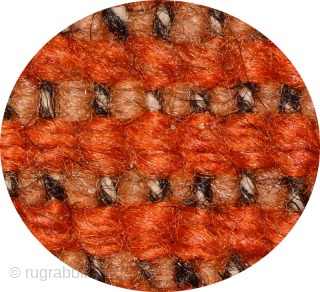 Two toned Tibetan khaden that uses a repeating ‘gau box’ (or amulet) motif as the design, with a mild abrash through both the orange and tan colours and which, given the predominate  ...