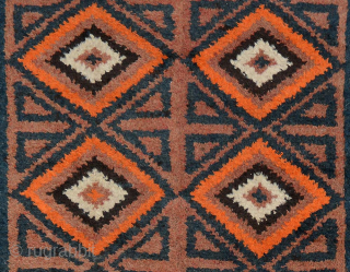 An Uzbek julkhyr consisting of four vertical ‘panels’ or strips (two wide centre panels, two narrow border strips) individually warp-faced woven on a long narrow loom then stitched together after their removal. ...