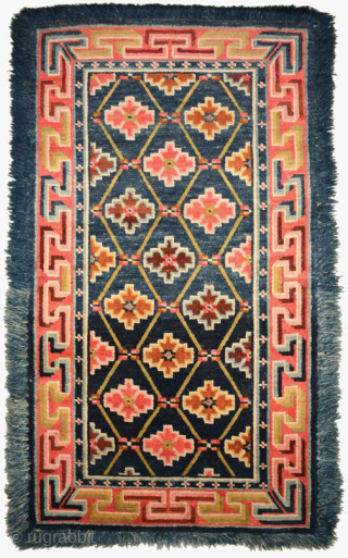 Matched pair of fringed Tibetan carpets. Both carpets have cotton warp and wool weft, the dyes are primarily natural and they were made circa the 1920's. Sizes are 152cm x 93cm (approx.  ...