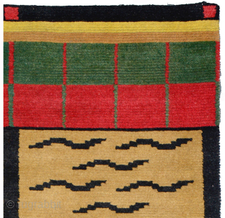 Tiger striped Tibetan 'goyo' or door rug (well, actually, a door ‘curtain’). These pile woven goyo’s with the crossed / quadrant design, and the coloured ‘bars’ across the top, mimic the more  ...