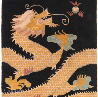 Chinese ‘pillar’ carpet made specifically to go around columns or ‘pillars’ in a Buddhist monastery. Here the golden scaled dragon is depicted chasing the Precious Jewel, with the dragons head and flowing  ...