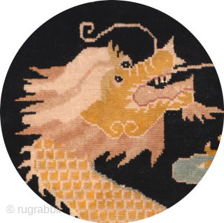 Chinese ‘pillar’ carpet made specifically to go around columns or ‘pillars’ in a Buddhist monastery. Here the golden scaled dragon is depicted chasing the Precious Jewel, with the dragons head and flowing  ...