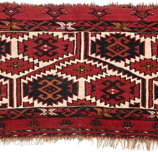The front panel / face of a Turkoman torba(?) that has a pile of lovely shiny wool and undyed cotton (all the white areas) on what appears to be a goat or  ...