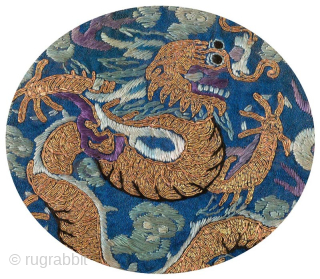 Beautiful Qing / Ch’ing Chinese Imperial Dynasty hand woven roundel depicting a five clawed dragon shown in profile in gold wrapped silk thread and attached to the roundel base using the 'couched  ...