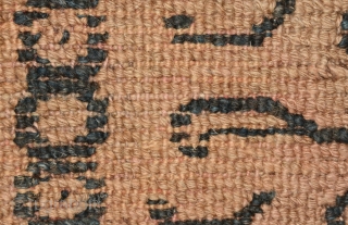 Impressive Tibetan masho or 'above-saddle' carpet portraying a tiger pelt, with a benign, almost 'pussy-cat' like face. The very light brown wool is un-dyed, while the tiger pelt design itself, which at  ...