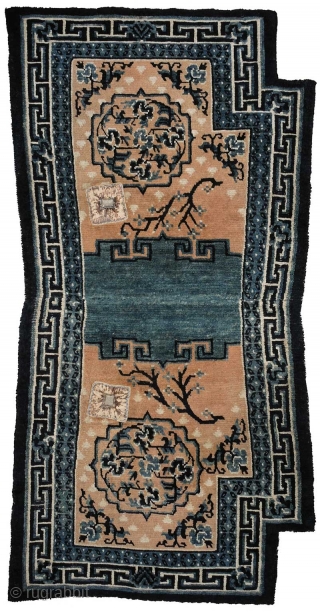 Masterful design execution and wonderful natural indigo dyes went in to the making of this Tibetan Makden. It has a central floral motif on each side which is encased in a mandala  ...