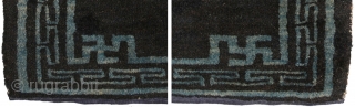 Very attractive Tibetan blue seating carpet with seven small mandala-like ‘medallions’ floating in the main field, each enclosing an auspicious swastika or sauswastika (i.e. a reverse swastika), with a 'T' shaped meander  ...