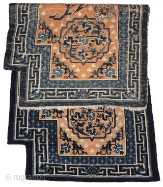 Masterful design execution and wonderful natural indigo dyes went in to the making of this Tibetan Makden. It has a central floral motif on each side which is encased in a mandala  ...